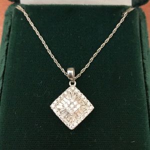 14K Gold White Diamond Pendant.